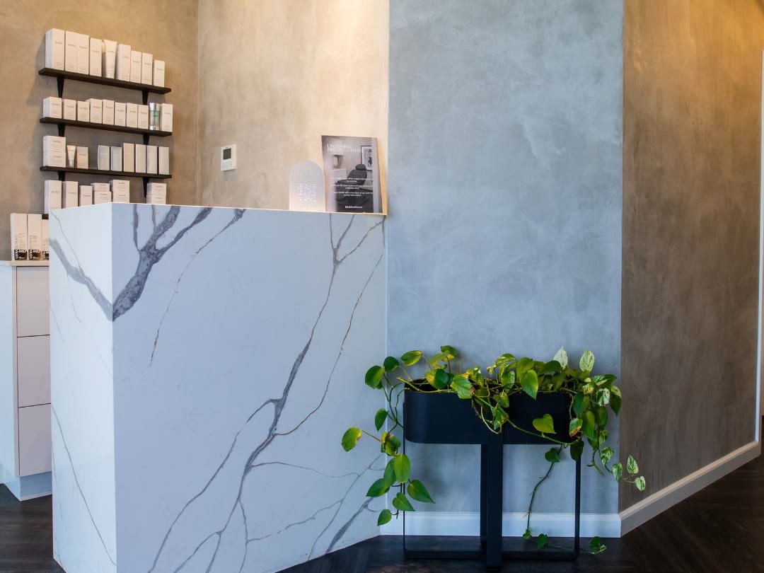 MedAesthetics clinic reception desk and skincare display